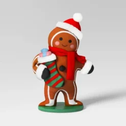 18" Fabric Gingerbread Man Holding Stocking Decorative Sculpture - Wondershop™ Brown 7 18" Fabric Gingerbread Man Holding Stocking Decorative Sculpture - Wondershop™ Brown -Wonder Shop USA GUEST 51f2a2ed e264 4894 a8fa 31aae4120bb1